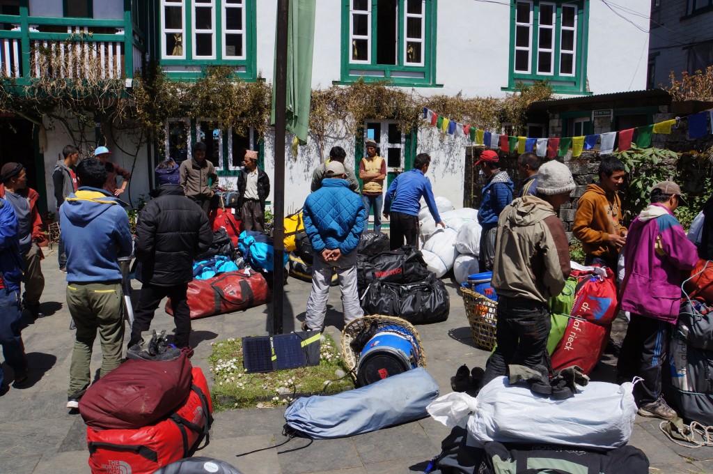 The amazing porters organize gear into manageable loads.