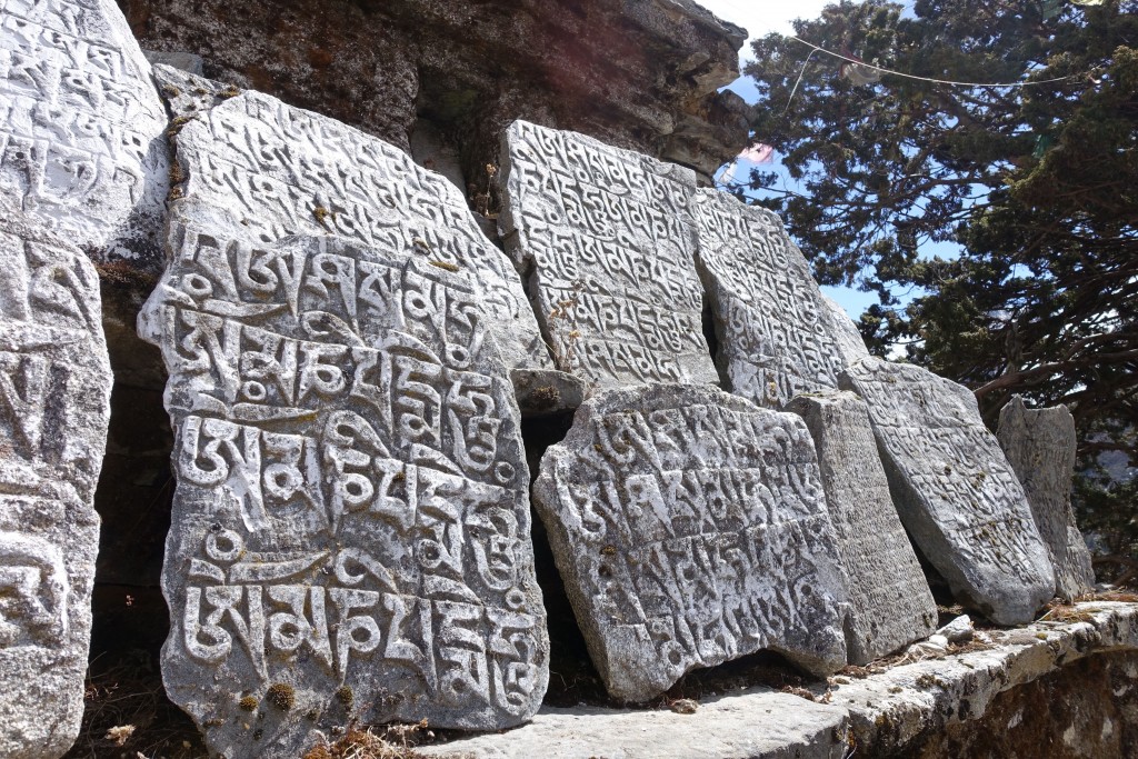 Prayer stones adorn the trail to the home of Lama Geshi in Pangboche. (Photo: Blake Penson)