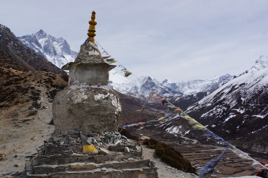 A stupa stands watch over the valley below.