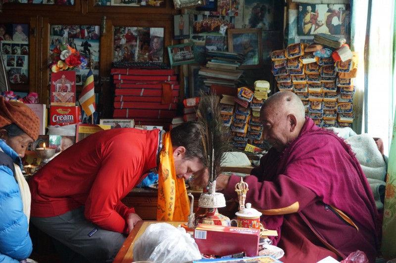 I receive a blessing of safe passage from Lama Geshi.  (Photo: Justin Merle)