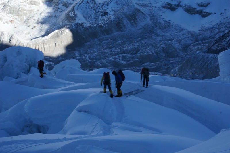 Some ladders are fixed horizontally to cross wide crevasses.  (Photo: Justin Merle)