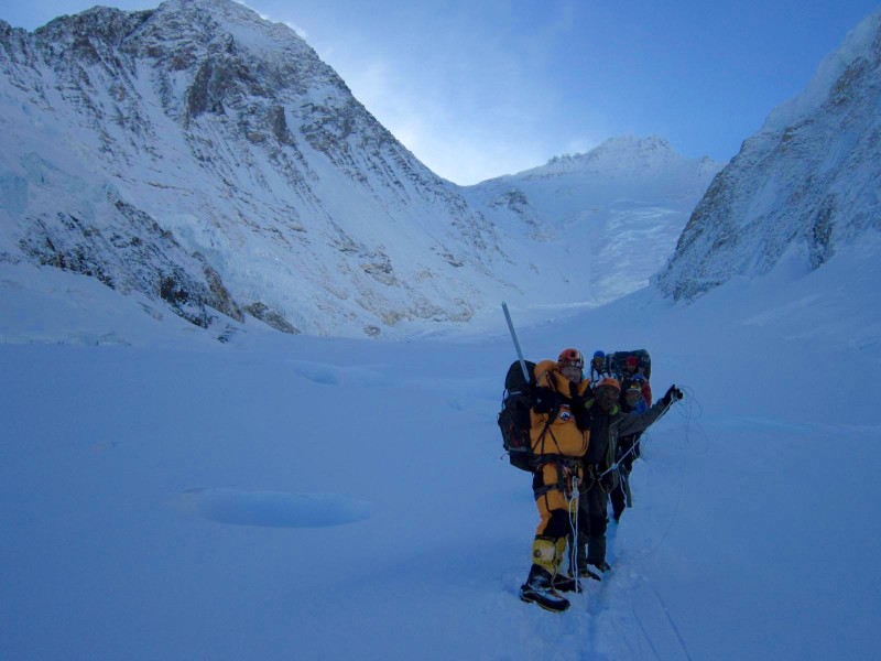 Halfway back to C1. Stress falling, our spirits rise with the climbing temperature. (Photo: Jangbu Sherpa)