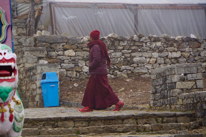 A monk at the monastery gate.