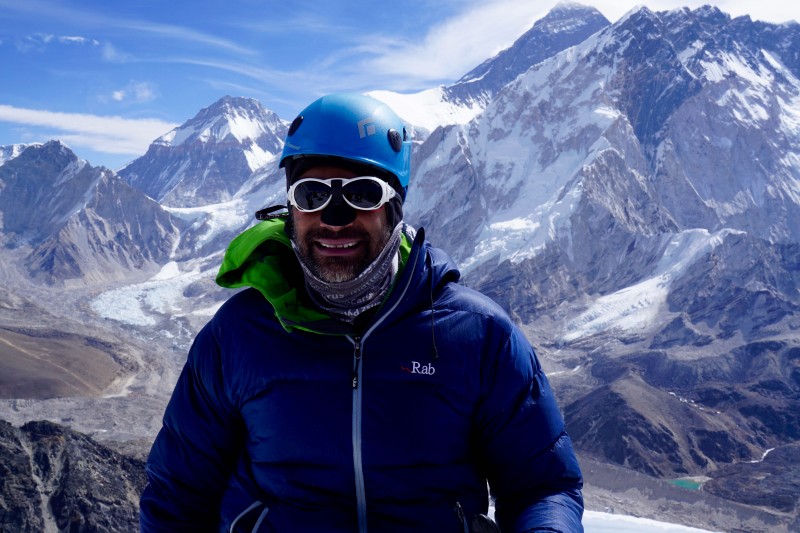 Siva on the summit, Everest behind him.