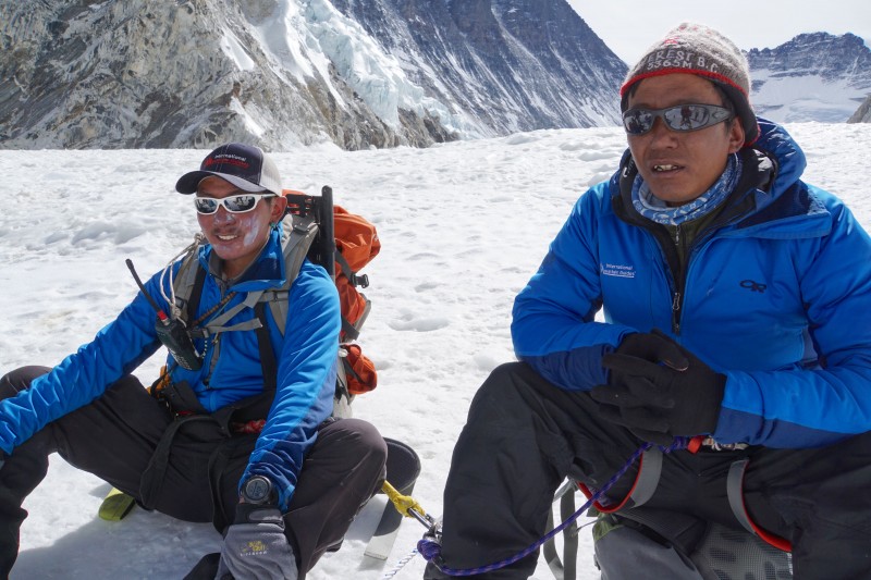 Two IMG Sherpa pause on their way down from Camp 2. 