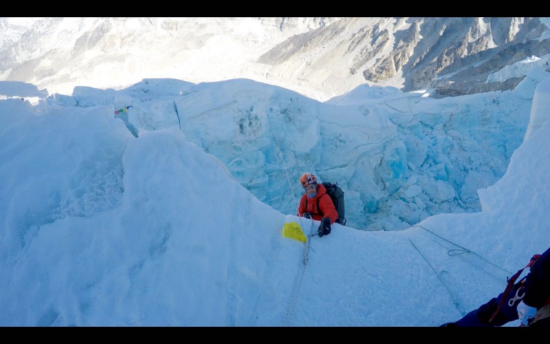 Justin negotiating the overhanging ice atop the rappel. (GoPro screenshot)