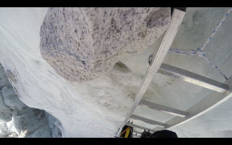 This granite boulder was lodged at the top of a ladder... creepy, but stable. (GoPro screenshot)