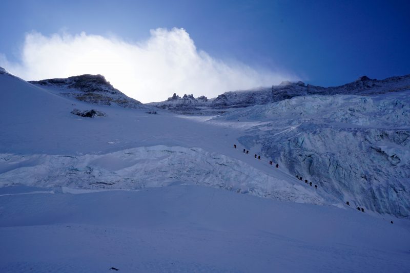 Climbers from other expeditions begin to exit the 'schrund. 