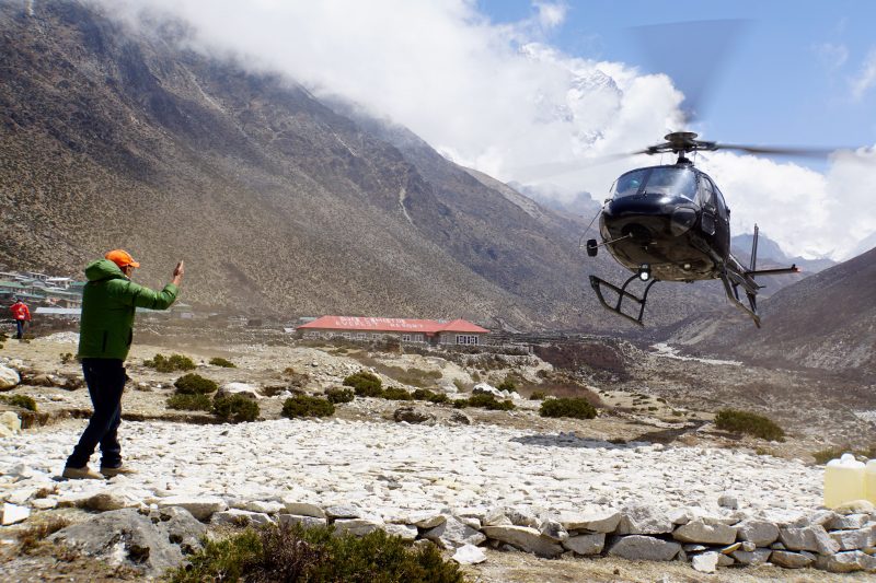 Our friends' Manang chopper arrives first. 