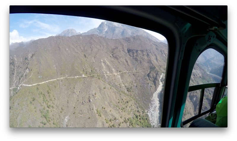 The Tenzing-Hillary memorial stupa, visible as a small white dot on the trail to Tengboche. (GoPro Screenshot)