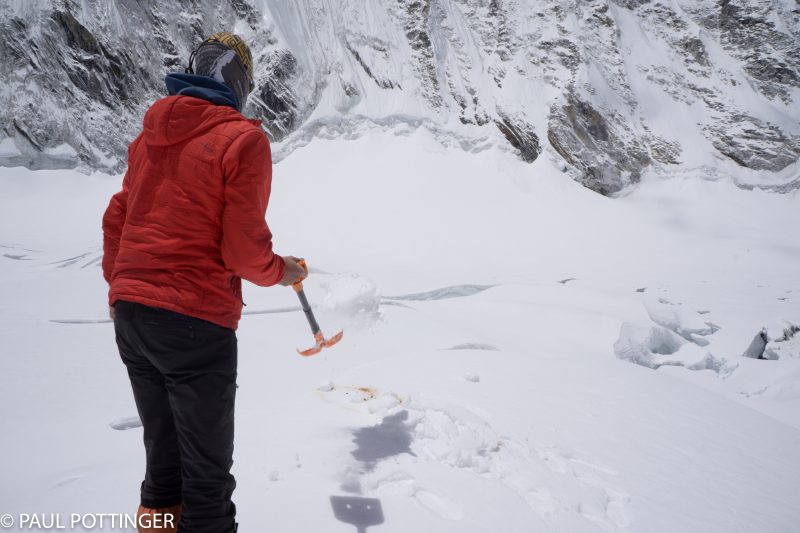 Even after scraping the waste into a crevasse, Justin is careful to cover the skidmark with fresh snow. It's the little details that count....
