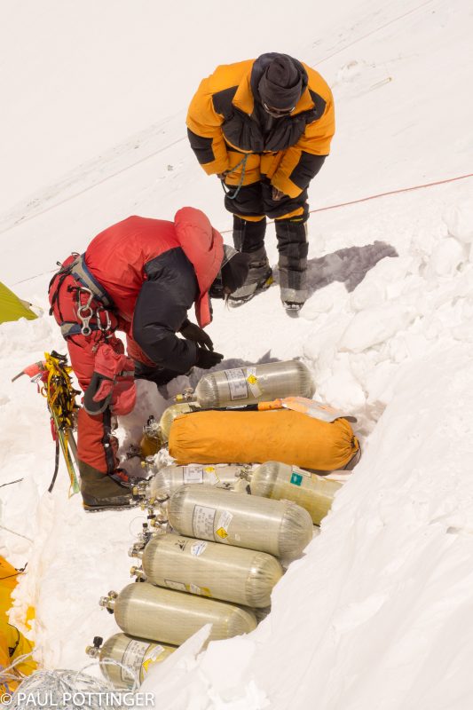 Sherpa guides working on the oxygen stockpile. Nicky and Bob's sharps staked out nearby.