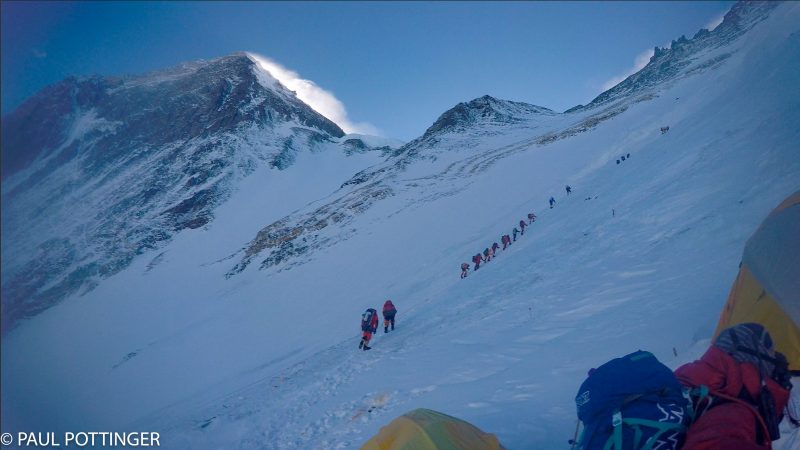 My teammates ascending the Lhotse Face immediately out of Camp 3. Everest on the left, Geneva Spur at center, Yellow band under that. Josh McDowell in foreground. (GoPro Screenshot)