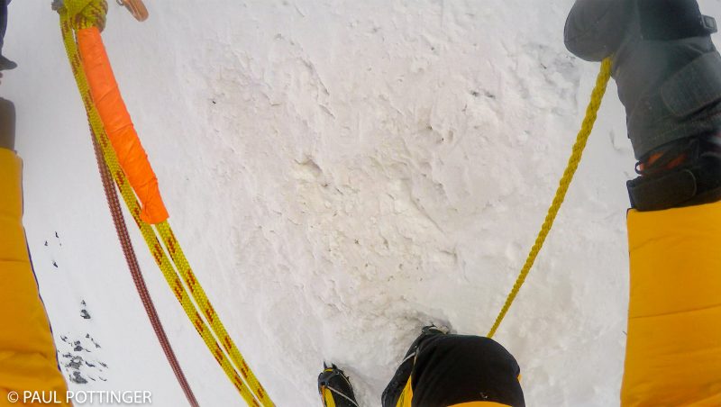 A nice surprise at the base of the Yellow Band cliff: A second line of static woven rope appears. Serves well as a backup handline. Posh to be sure.... (GoPro Screenshot) 