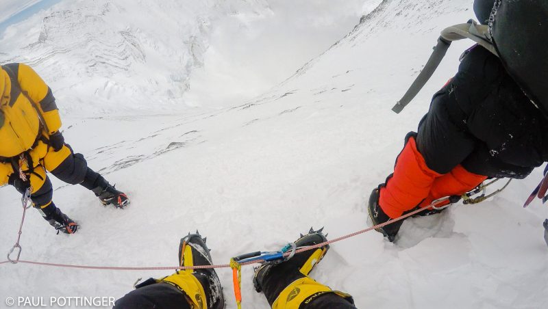 The view from my seat at the break below the Spur, circa 25,500 feet high. Underfoot, beyond the narrow path, the Lhotse face stretches 4,400 feet down to the Cwm. (GoPro Screenshot)
