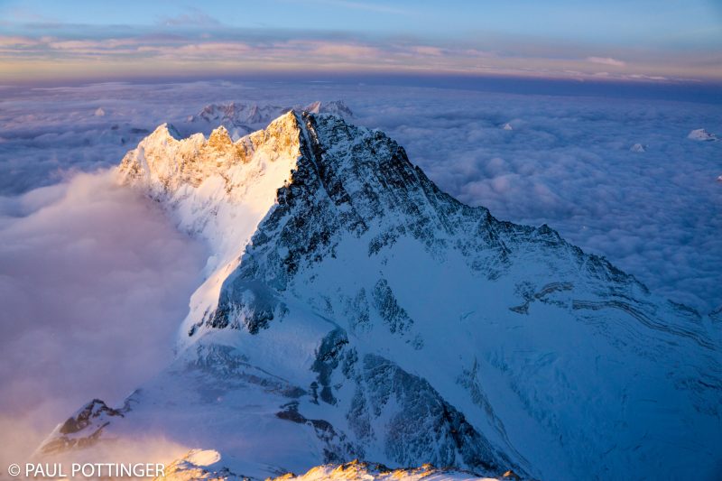 Lhotse at sunrise. Couloir to the summit is clear in this image, the long snowfilled line surrounded by dark rock.