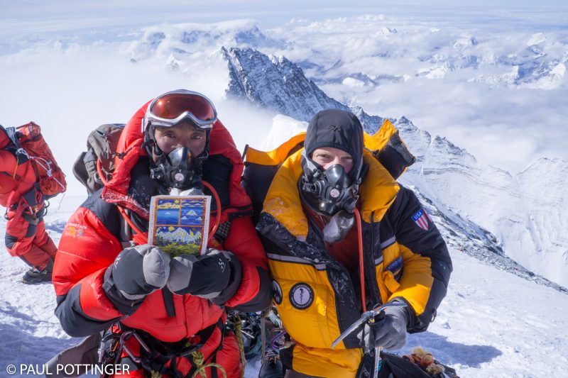 Pasang Kami and me on top. He is holding a card given to us by Lama Geshi. Proud to display it on the summit. Proud to have climbed with this amazing mountaineer.